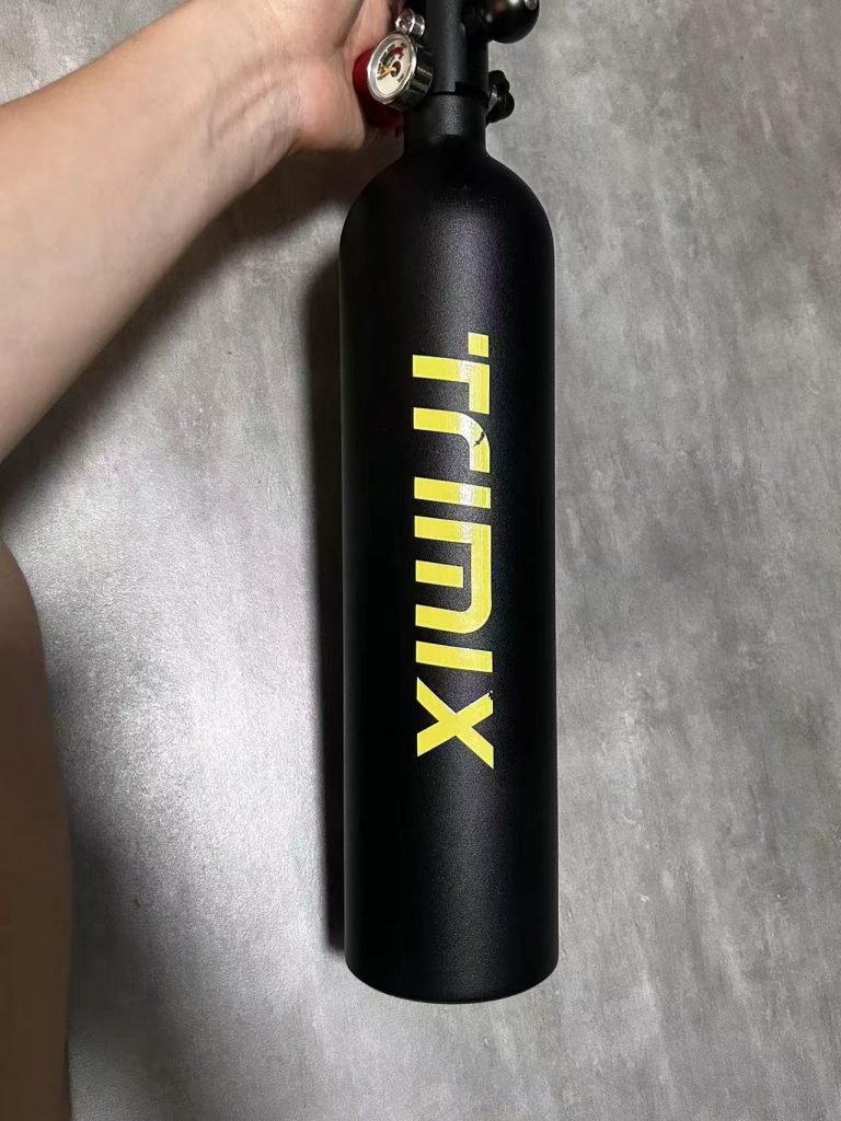Black TRIMIX cylinder on fabric