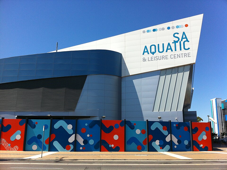 Exterior of South Australia Aquatic and Leisure Centre under a clear blue sky.