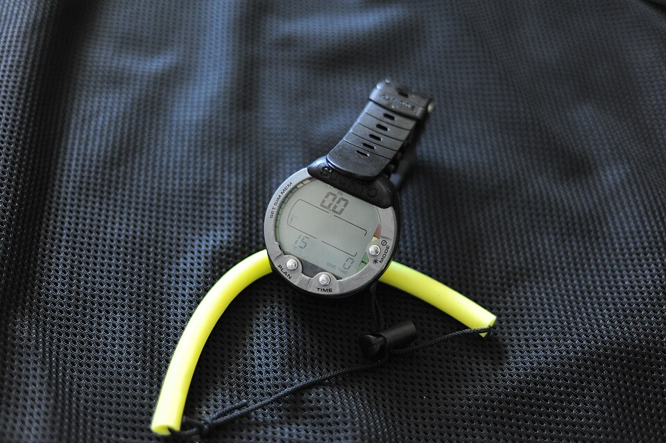 Historical Suunto Vyper wrist dive computer with its strap visible