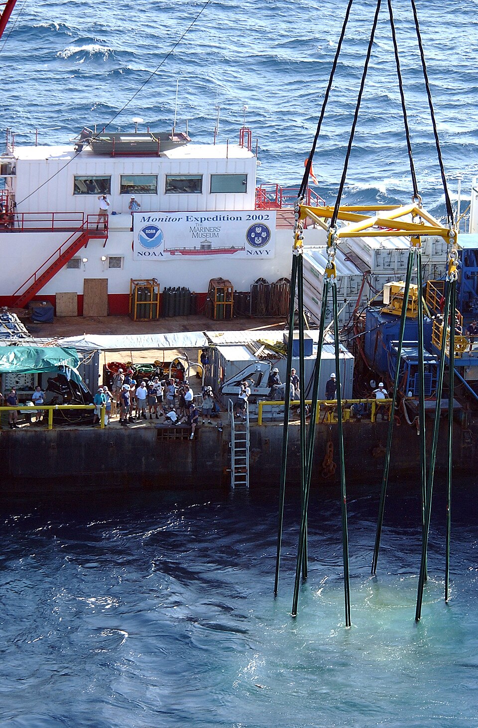 Salvage vessel, personnel and suspension cables during the 2002 USS Monitor recovery operation