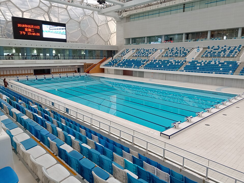 Historical wide photograph of swimming lanes and spectator seats inside the Water Cube in Beijing on May 15, 2018.