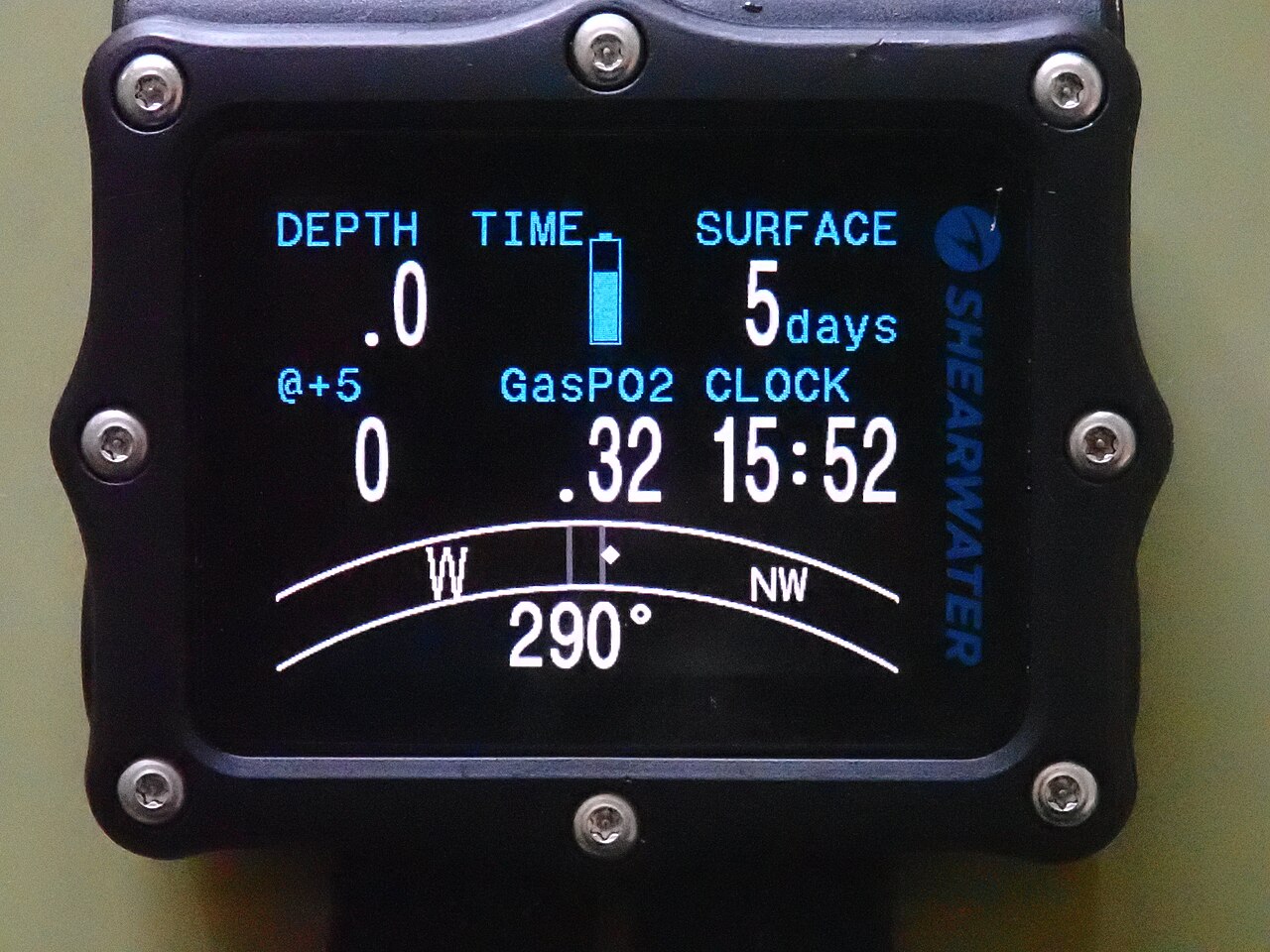Close-up photograph of an original Shearwater Perdix dive computer in compass mode